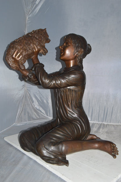 Girl Playing With Her Little Dog Bronze Statue -  Size: 22"L x 22"W x 30"H.