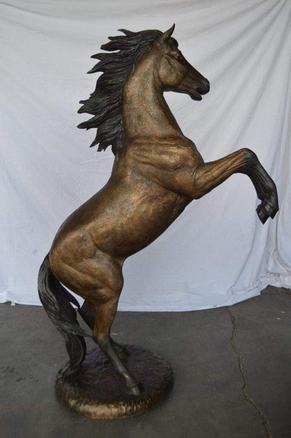 Beautiful stallion horse bronze statue -  Size: 47"L x 28"W x 74"H.