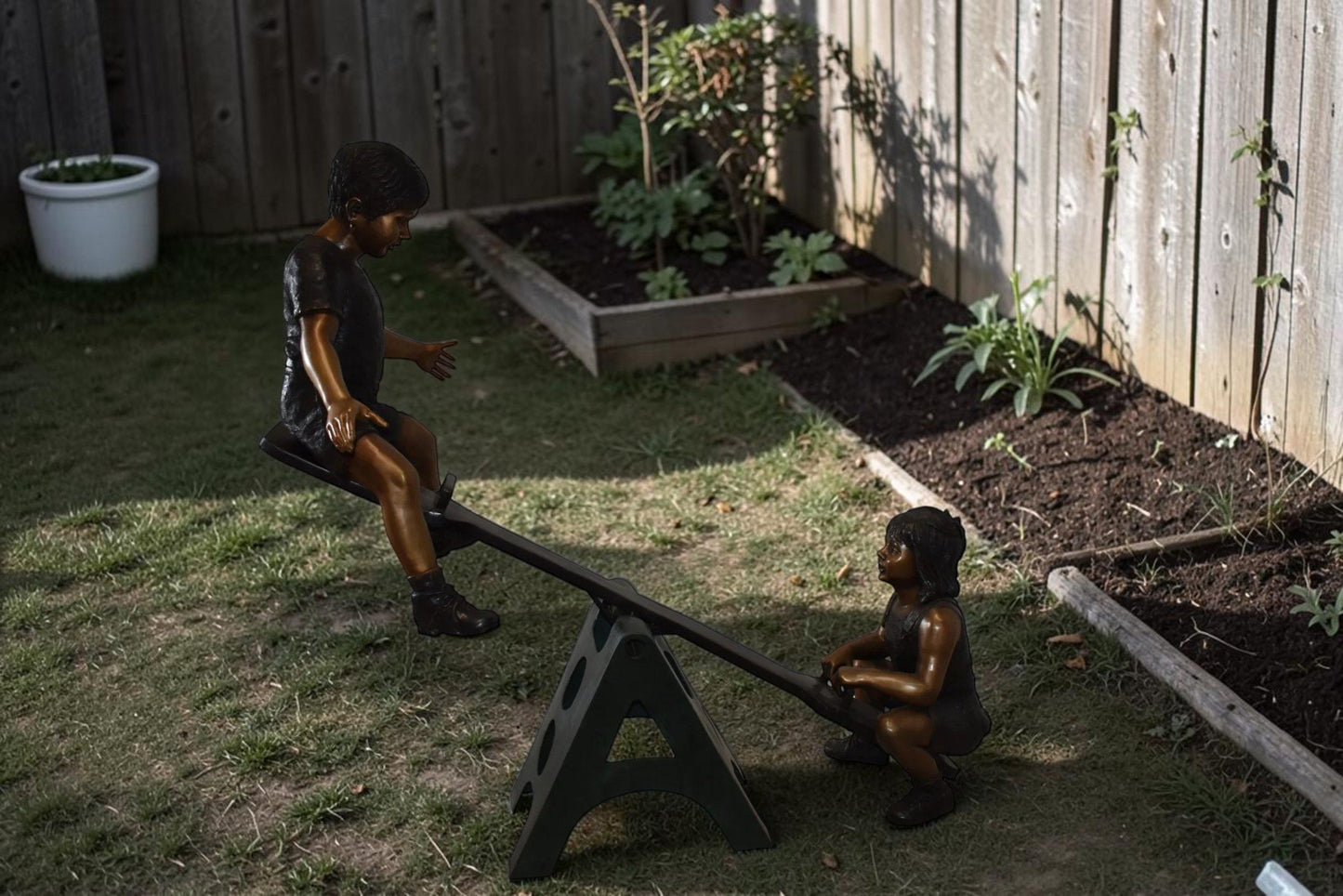 Playful Children on a See-Saw Bronze Statue Size: 76" x 27" x 59"H