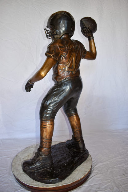 Young Boy Playing Football Bronze Statue Size: 26" x 14" x 43"H
