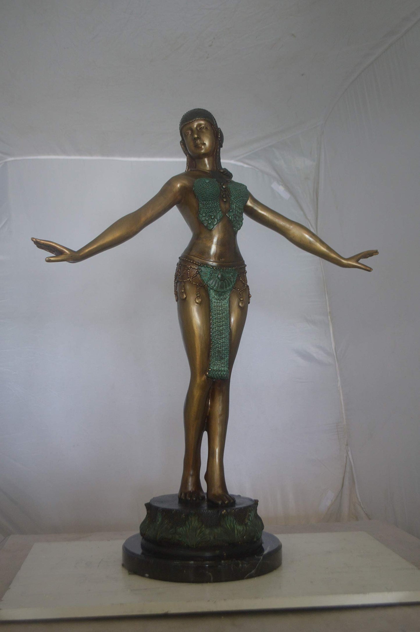 Belly Dancer Performing Bronze Statue -  Size: 32"L x 8"W x 41"H.