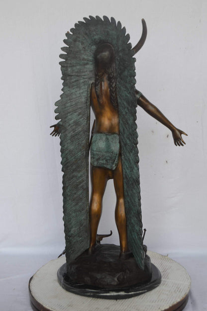 Indian with Plume bronze statue - Size: 22"L x 14"W x 38"H.