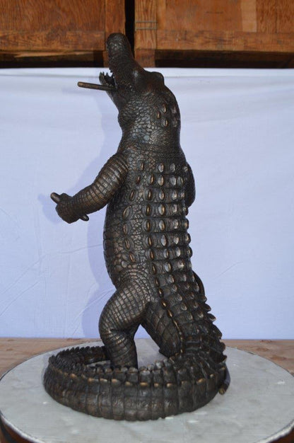 Alligator having fun bronze statue - fountain -  Size: 15"L x 15"W x 31"H.