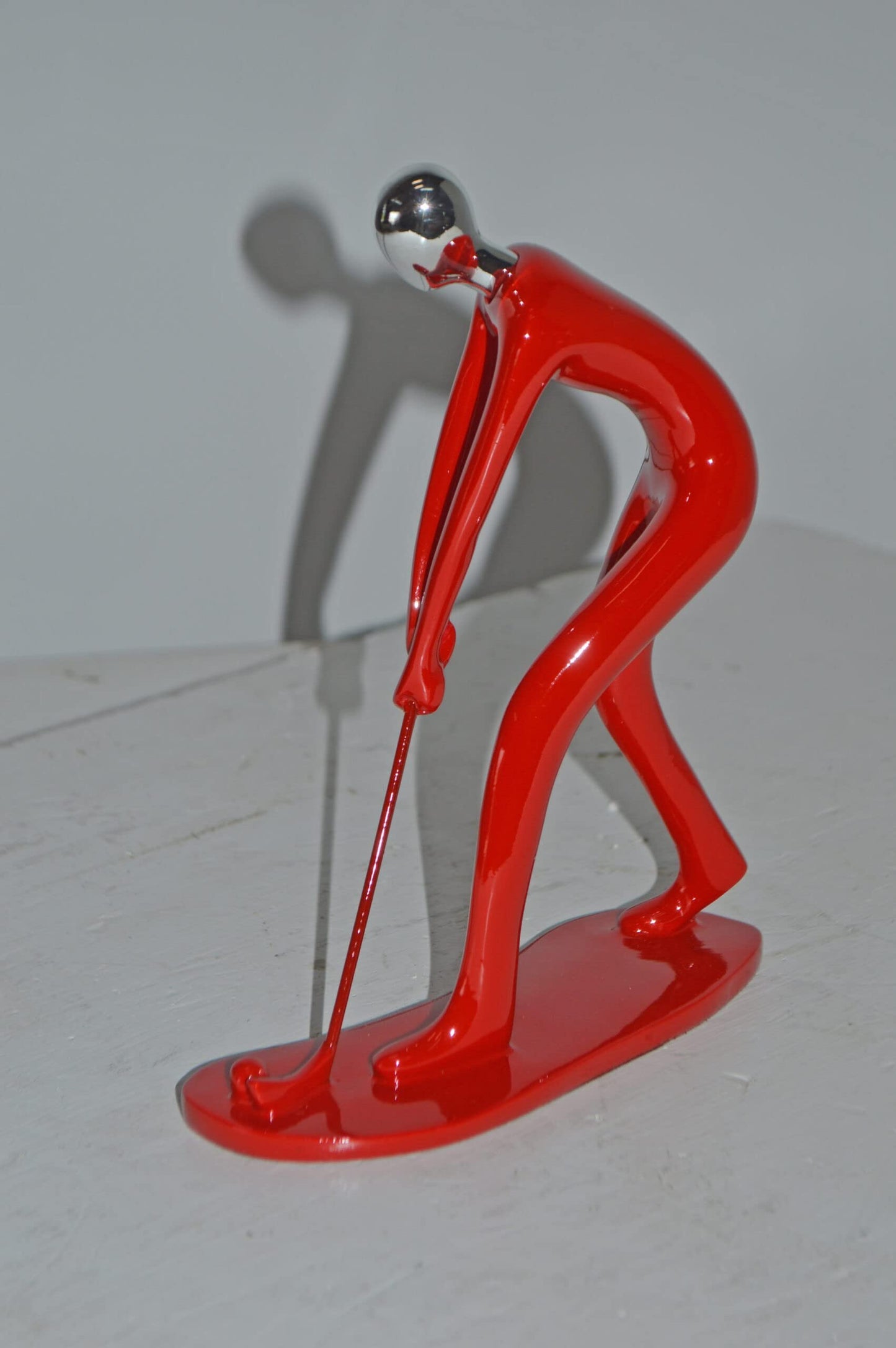Modern art Red Golfer with Silver Head Resin Statue - Size: 7"L x 2"W x 9"H.