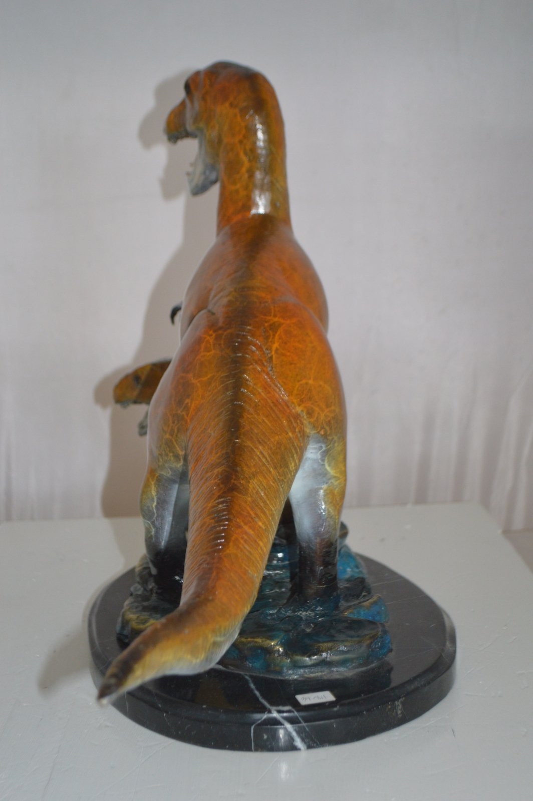 Dinosaur and baby Dino Bronze Statue -  Size: 26"L x 11"W x 18"H.