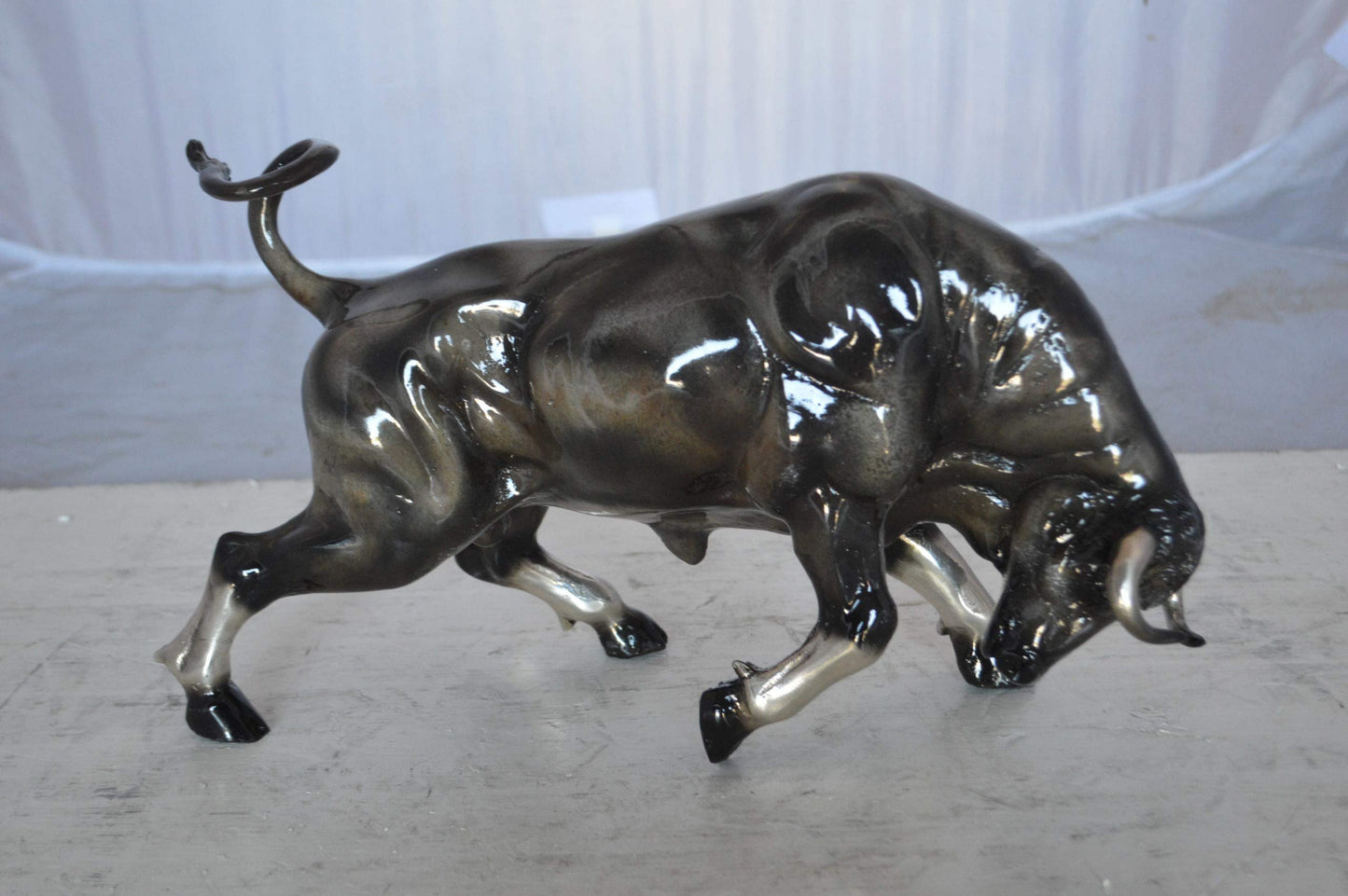 Charging Bull Bronze Statue -  Size: 15"L x 5"W x 8"H.