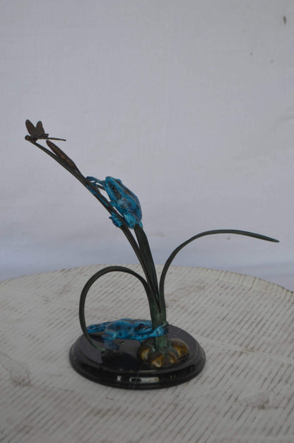 Two Blue Frogs catching a dragonfly Bronze Statue - Size: 14"L x 8"W x 12"H.