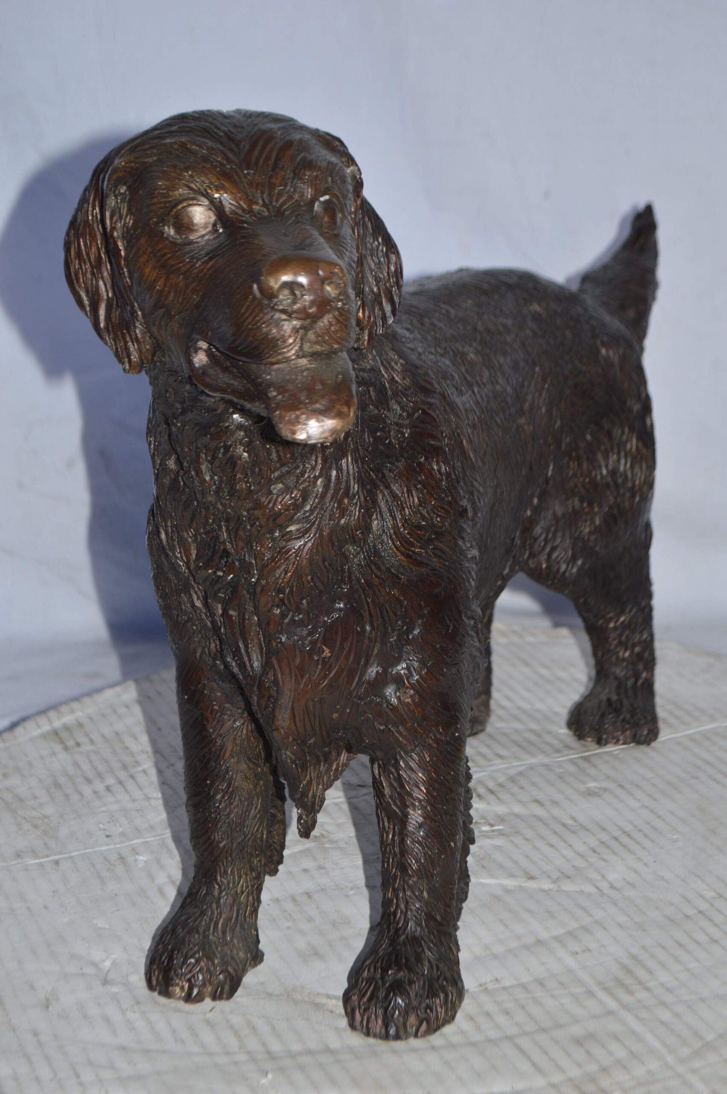 Golden Retriever dog bronze statue - Size: 26"L x 7"W x 16"H.