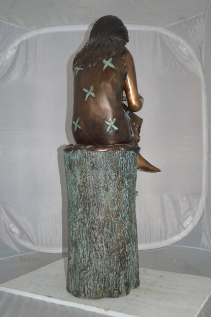 Sitting Girl on Log Reading a Book Bronze Statue -  Size: 19"L x 13"W x 48"H.