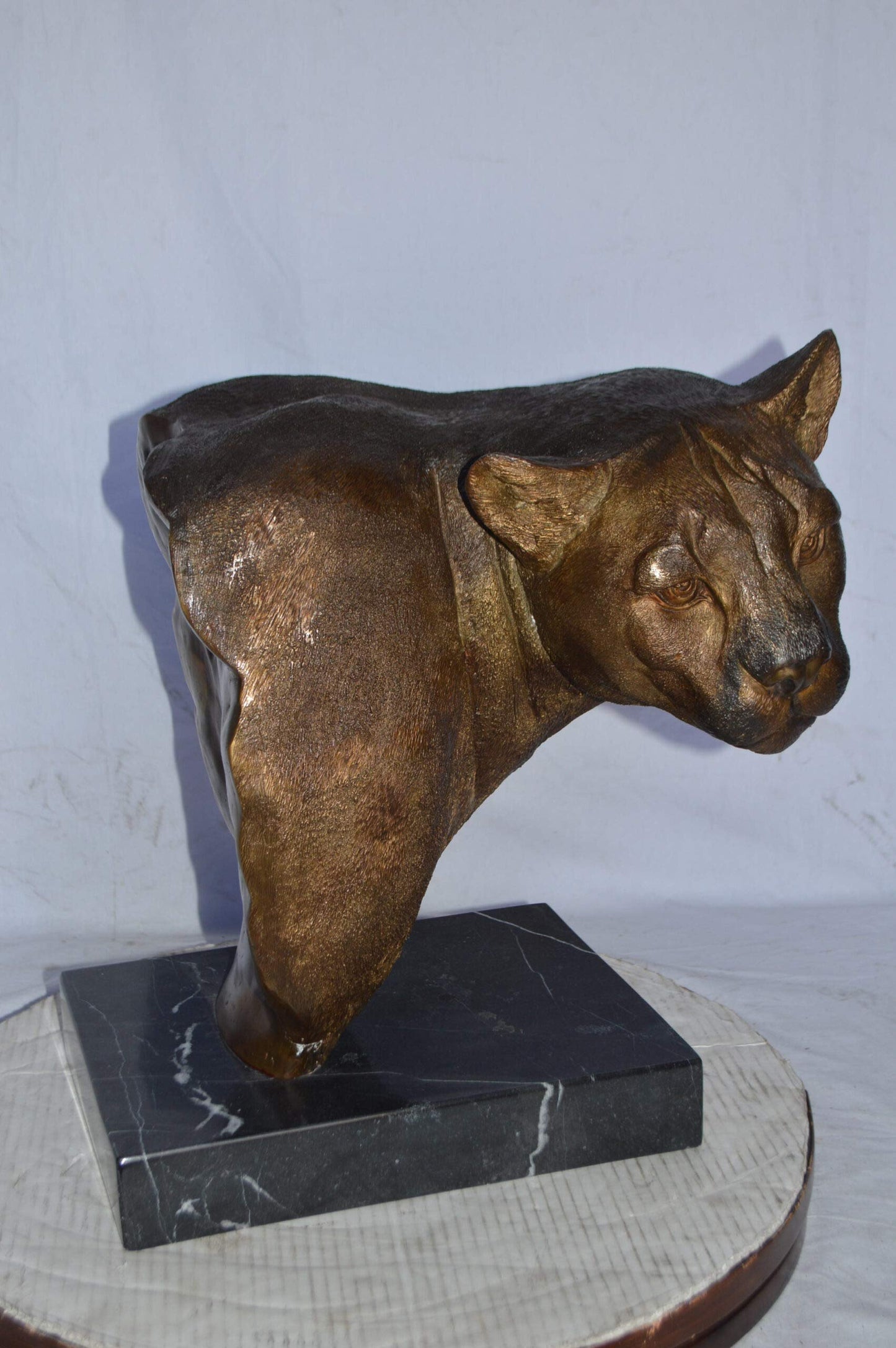 Mountain Lion Head bronze statue on a marble base - Size: 18"L x 15"W x 21"H.