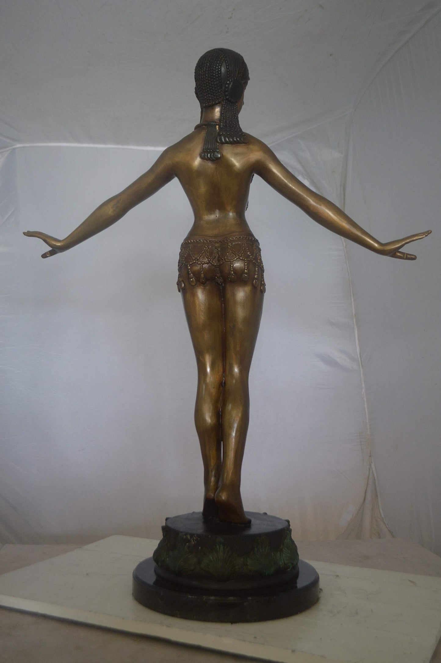 Belly Dancer Performing Bronze Statue -  Size: 32"L x 8"W x 41"H.