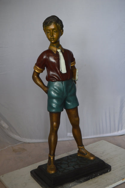 Kid Holding a Book Bronze Statue -  Size: 18"L x 11"W x 36"H.