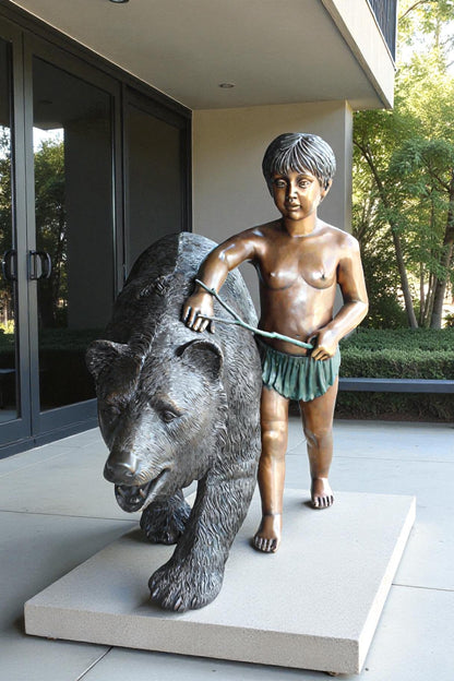 A bear with a boy bronze statue -  Size: 39"L x 24"W x 32"H.
