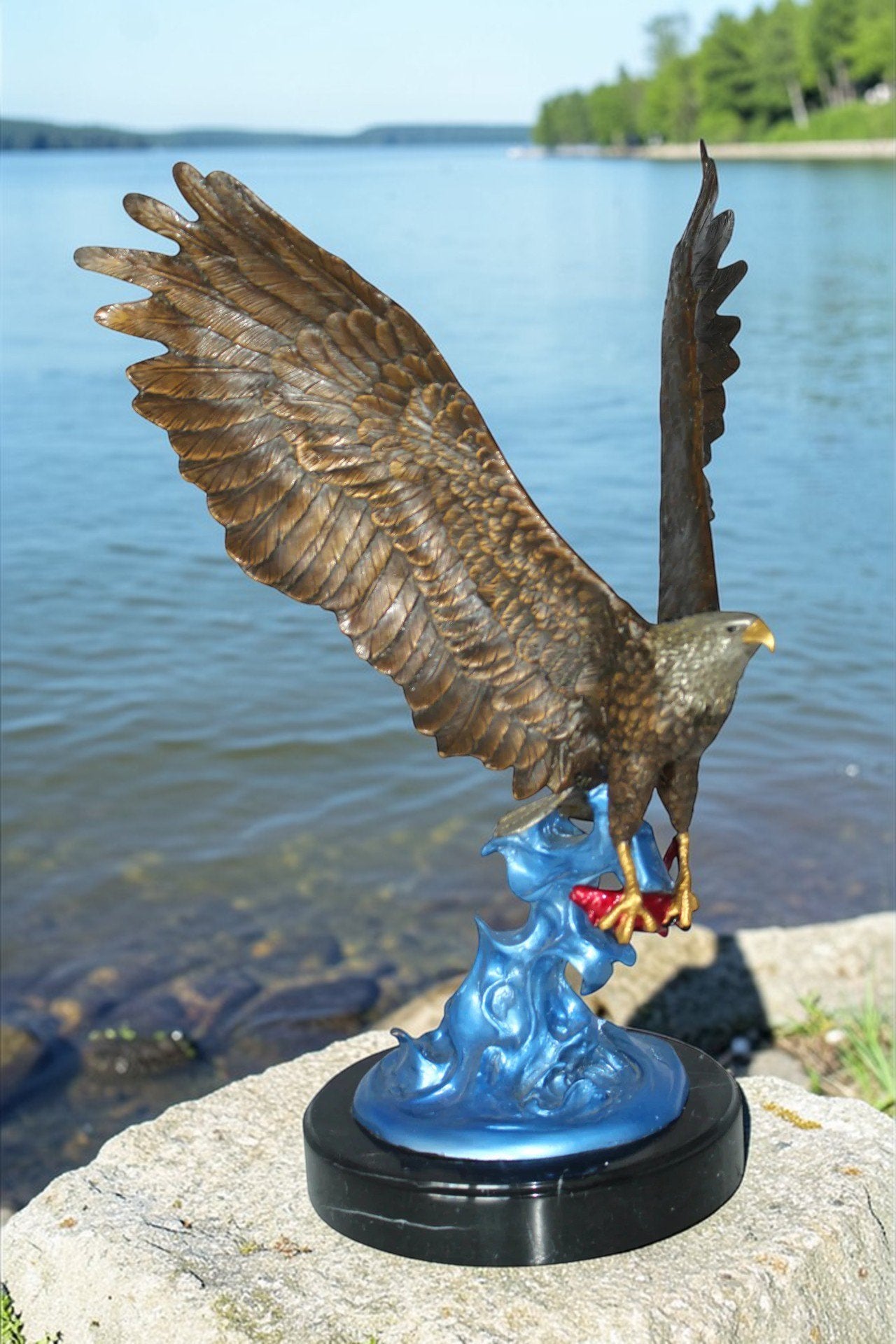 Eagle Catching his Prey Bronze Statue -  Size: 17"L x 20"W x 25"H.