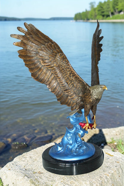 Eagle Catching his Prey Bronze Statue -  Size: 17"L x 20"W x 25"H.