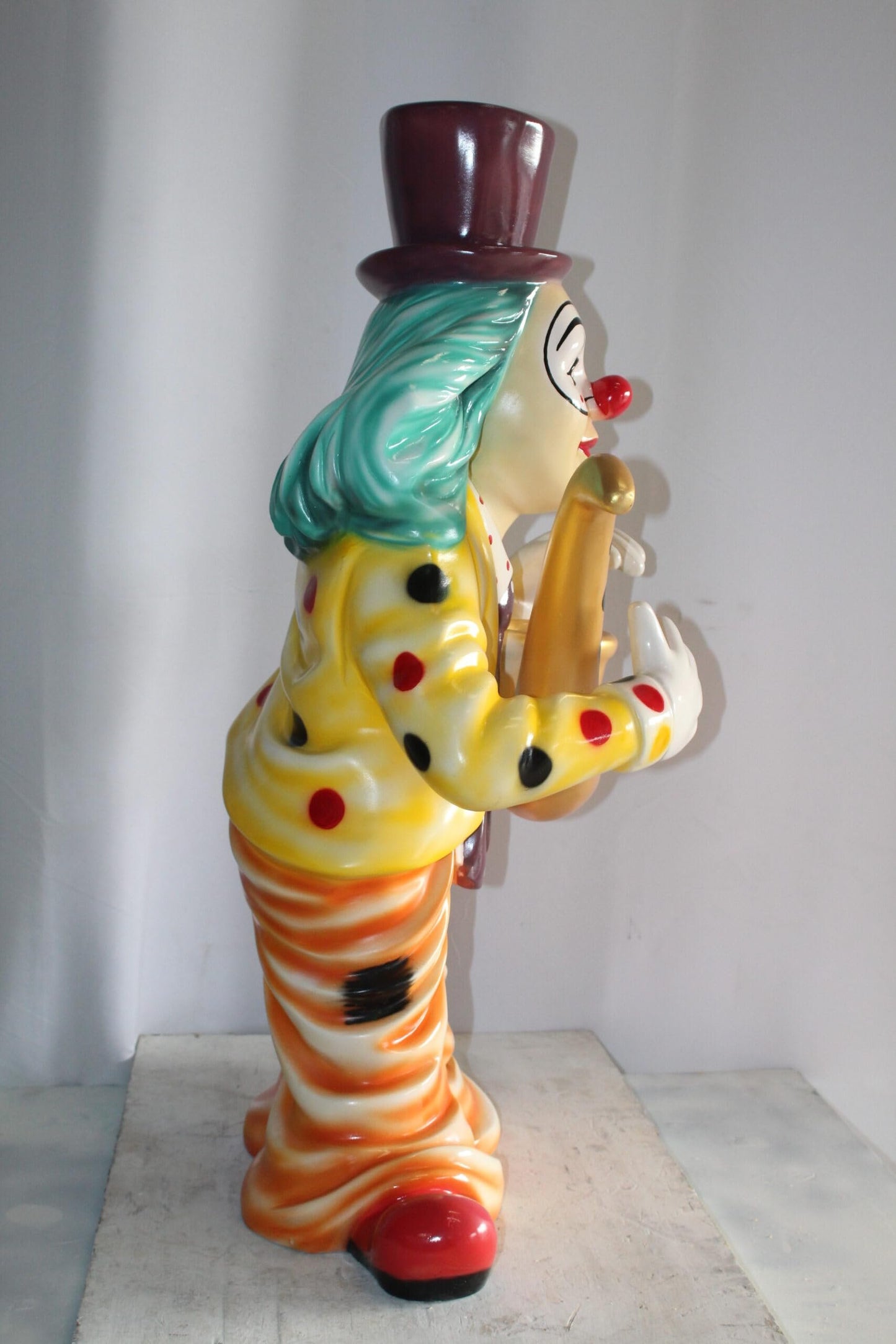 Whimsical Clown Fiberglass Statue, Jazzing Up with Saxophone 19" x 18" x 36"H