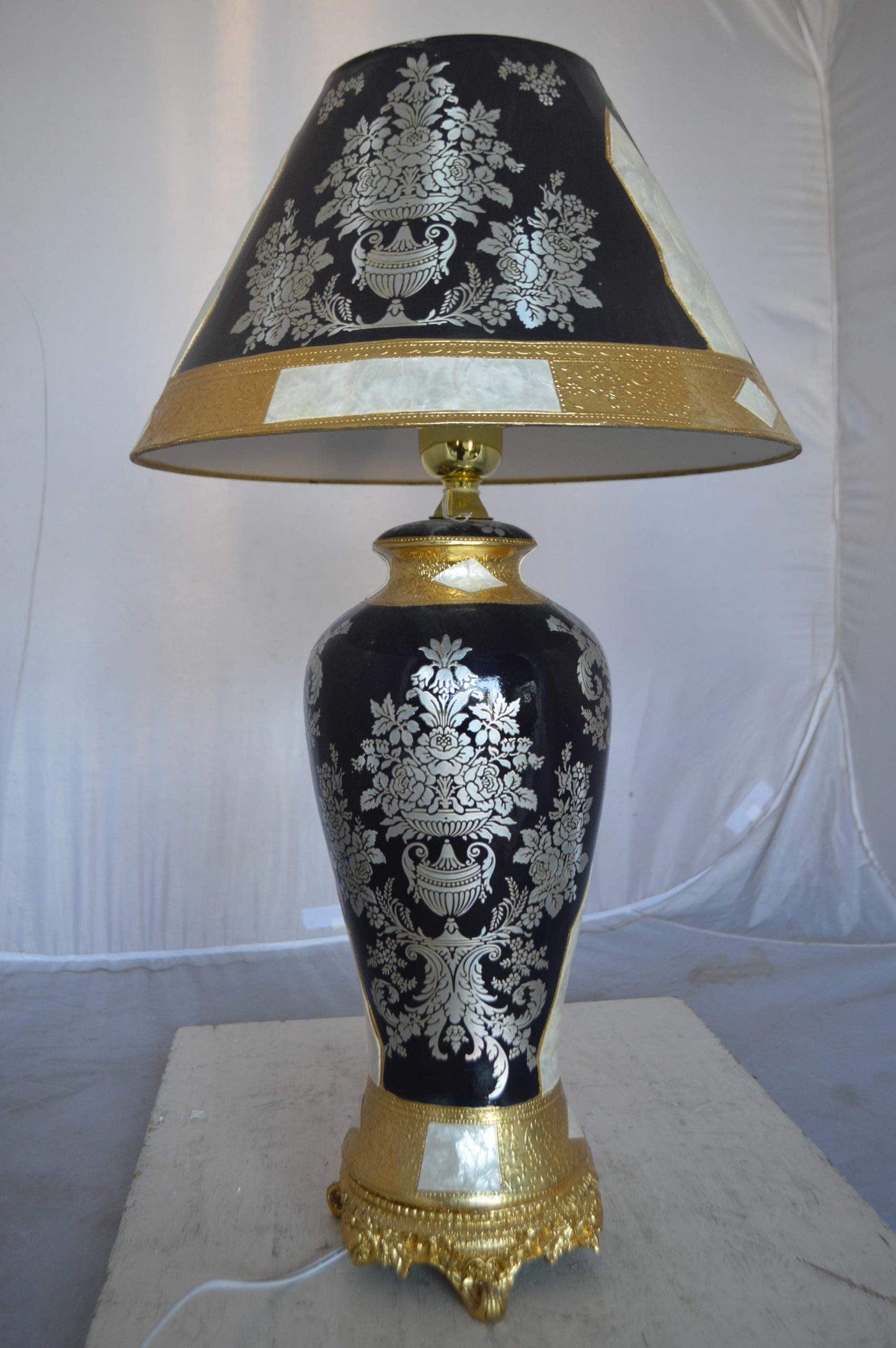 Gold and Silver lamp made of resin -  Size: 18"L x 18"W x 30"H.