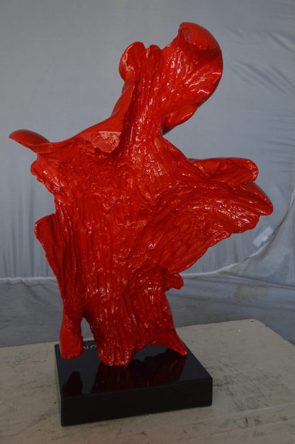Modern resin statue of a man hugged by a woman -  Size: 17"L x 8"W x 24"H.