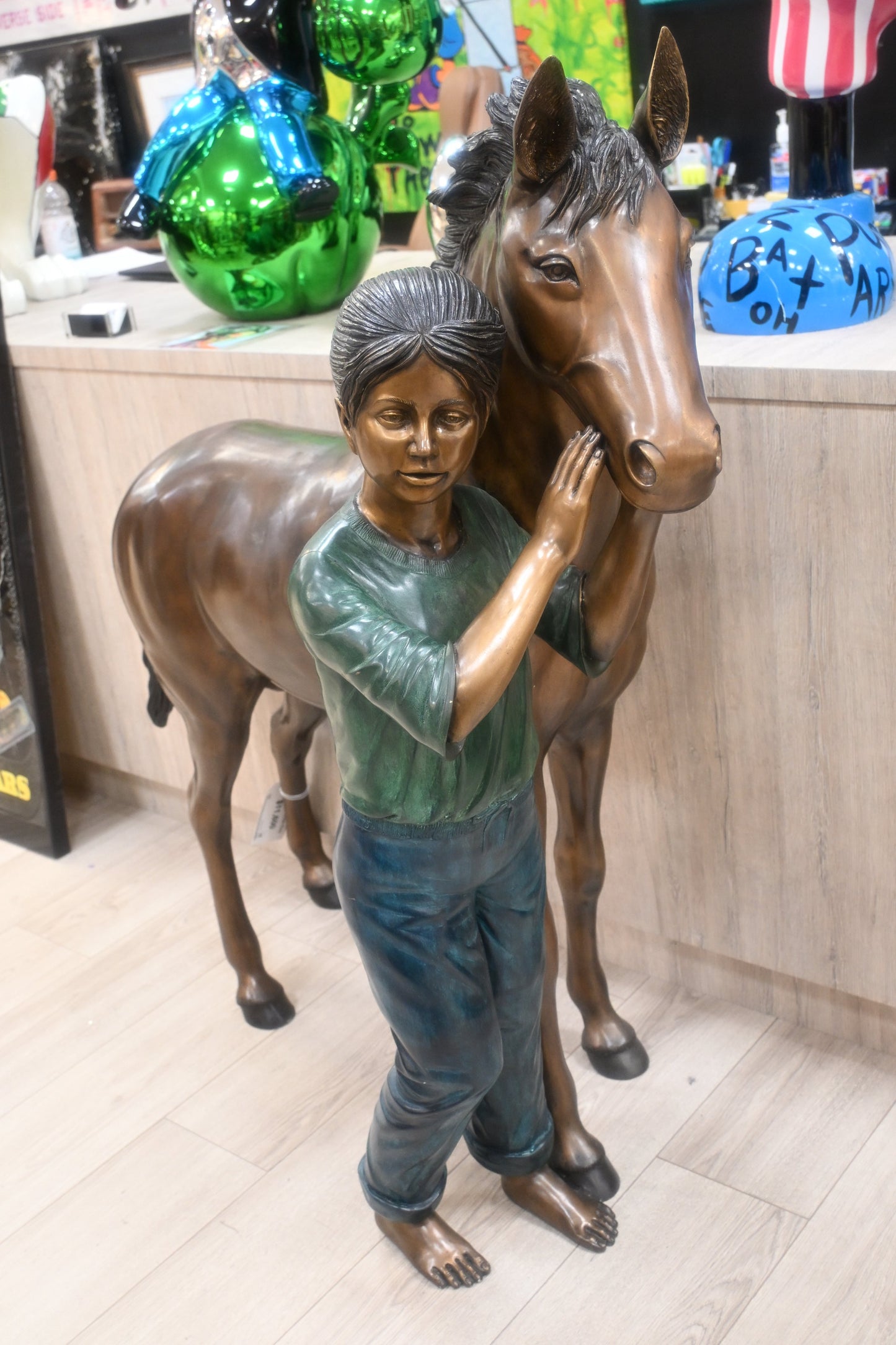 Young Girl and her pony Bronze Statue -  Size: 48"L x 20"W x 48"H.