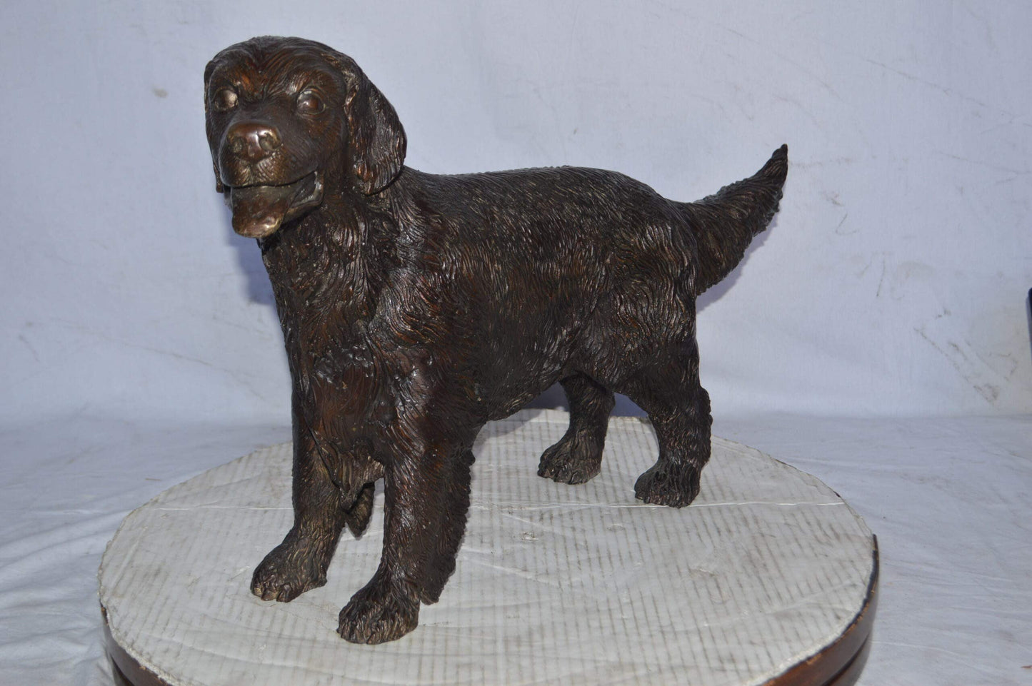 Golden Retriever dog bronze statue - Size: 26"L x 7"W x 16"H.