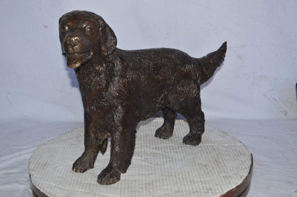 Golden Retriever dog bronze statue - Size: 26"L x 7"W x 16"H.