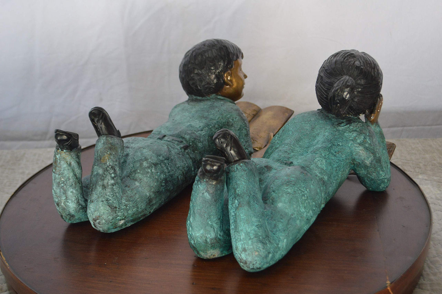 Set of a Boy and a Girl Reading a Book Bronze Statue -  Size: 16"L x 7"W x 8"H.