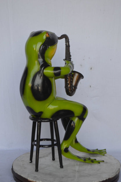 Green frog playing saxophone bronze statue - Size: 23"L x 15"W x 30"H.