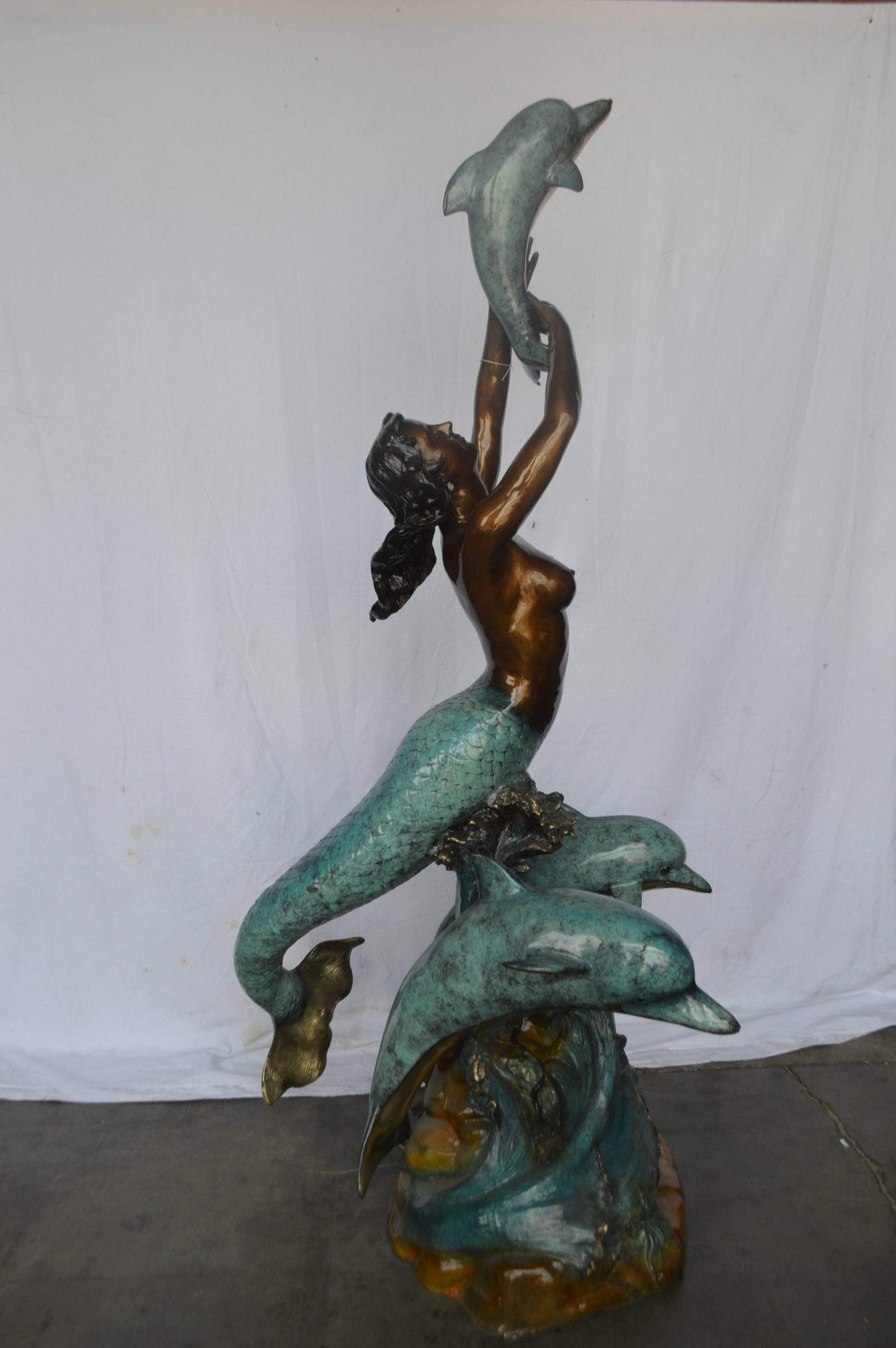 Mermaid and Three dolphins fountain bronze statue - Size: 34"L x 41"W x 83"H.