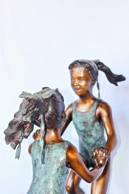 Young dancing girls circling fountain bronze statue -  Size: 14" x 29" x 38"H.