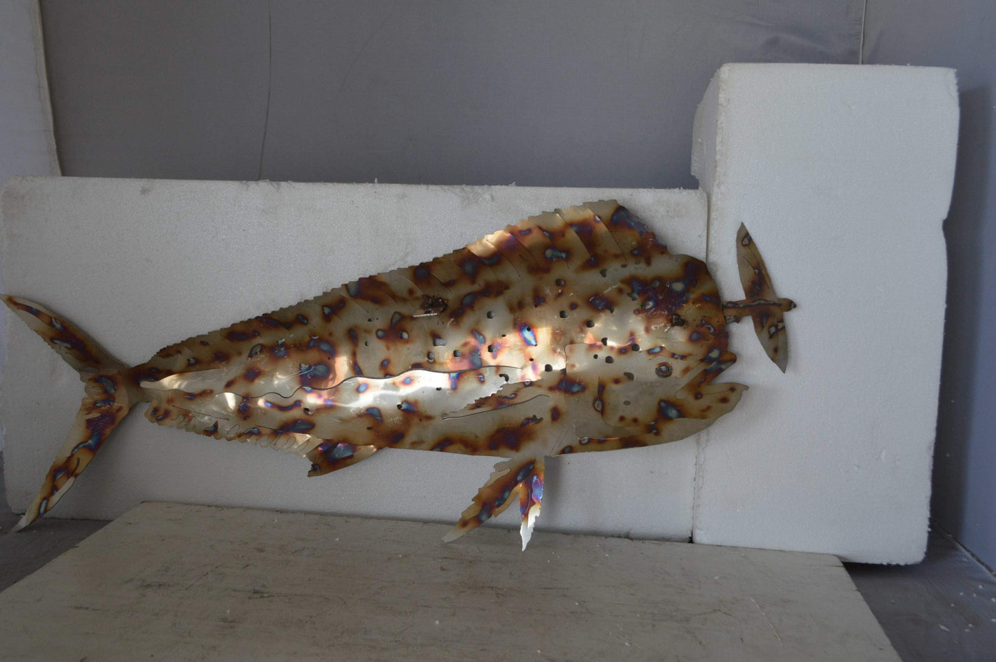 Mahi Mahi catching flying fish made of cut steel - Size: 39"L x 2"W x 12"H.