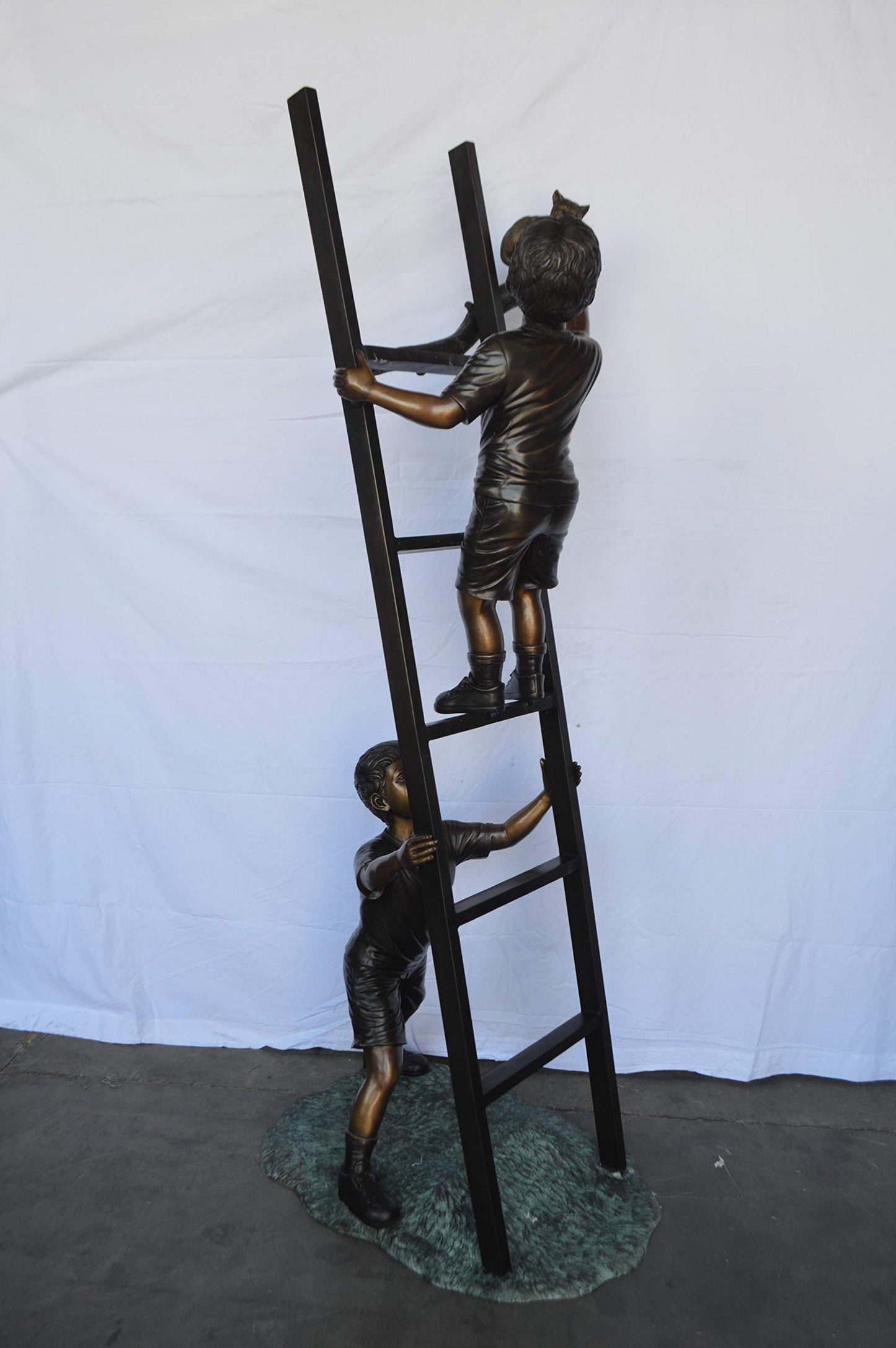 Two Kids Climb a Ladder Saving a Cat Bronze Statue -  Size: 35"L x 24"W x 81"H.