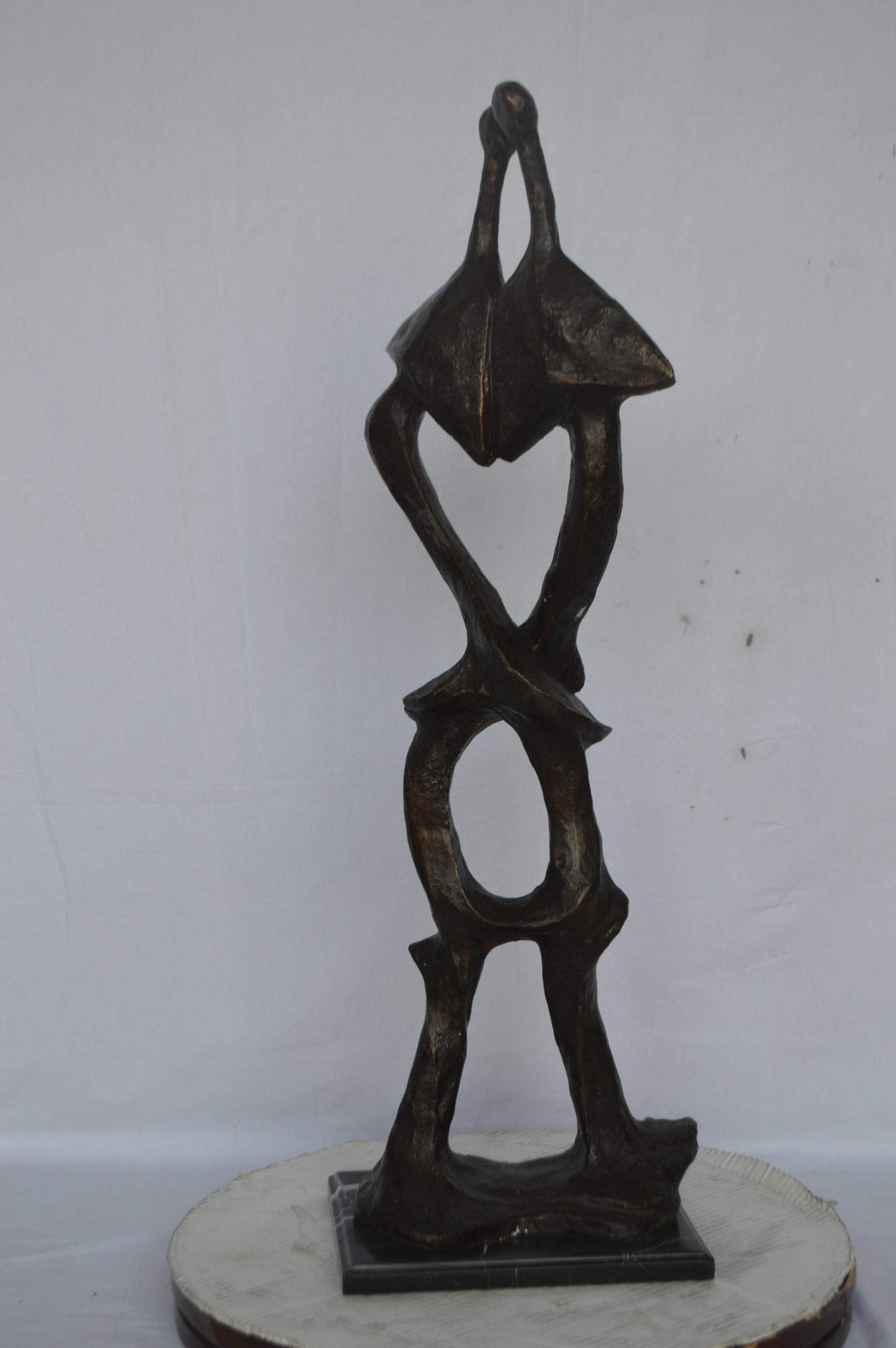 Modern art abstract, a couple kissing bronze statue - Size: 13"L x 11"W x 40"H.