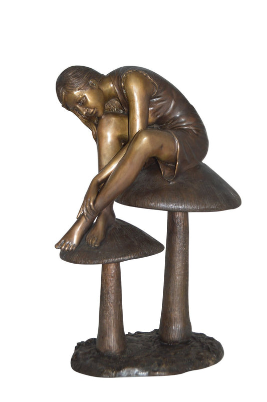 Girl sitting on Mushrooms Bronze Statue -  Size: 13"L x 11"W x 18"H.
