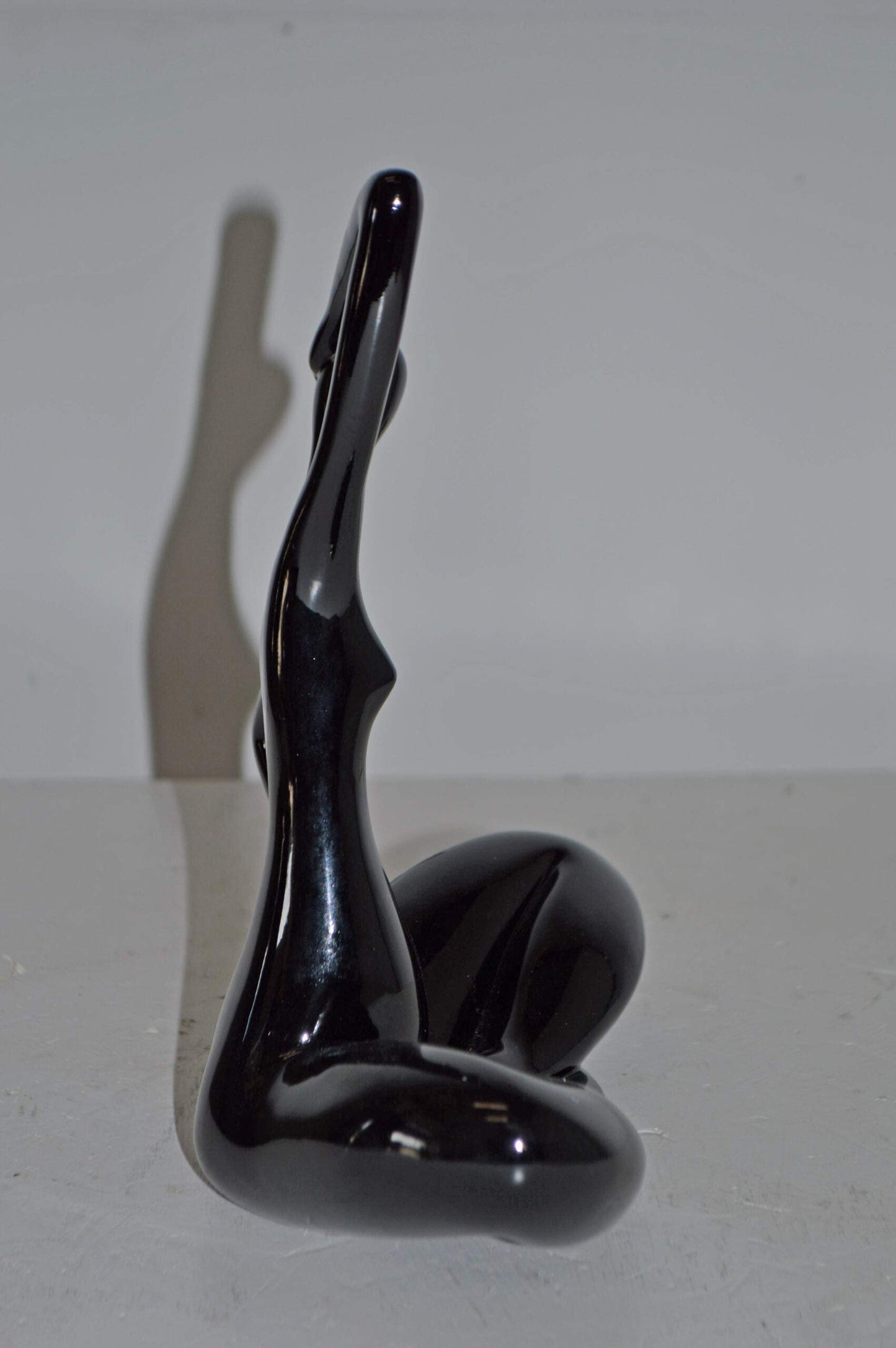 Modern Art Black Ballet Dancer Sitting Resin Statue - Size: 9"L x 5"W x 11"H.
