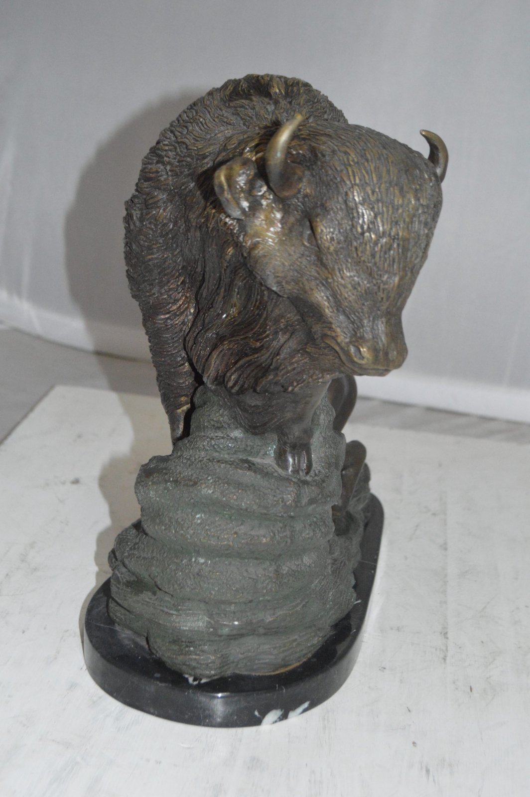 Bison Bronze Statue -  Size: 7"L x 14"W x 15"H.