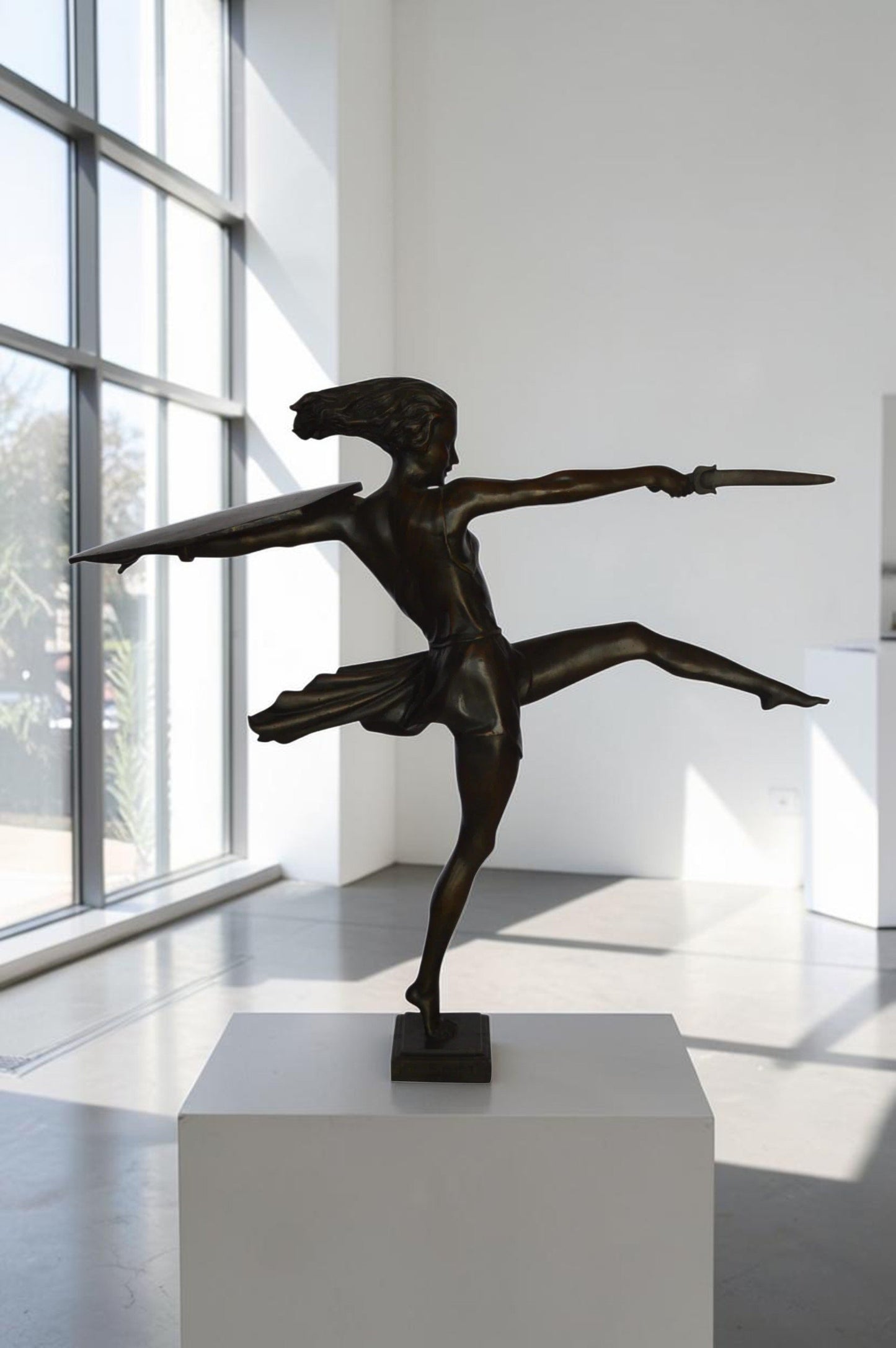 Woman Fighter with Sword Bronze Statue -  Size: 19"L x 5"W x 20"H.
