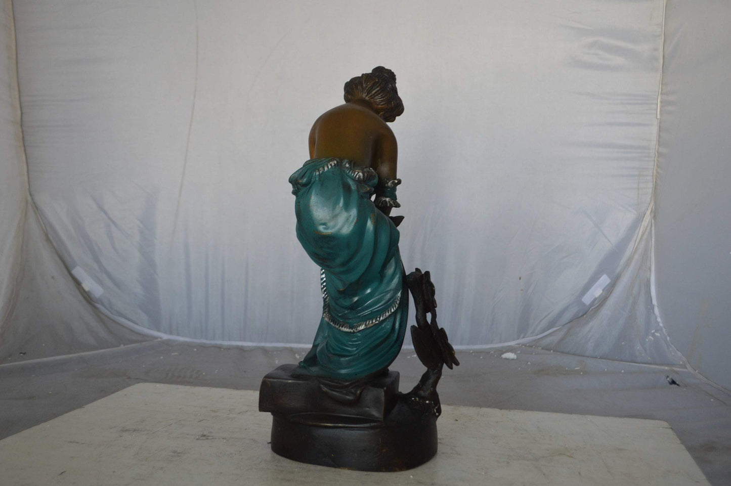 Lady holding a bird bronze statue - Size: 10"L x 9"W x 20"H.