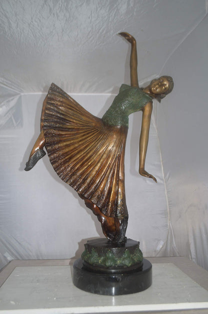 Beautiful Dancer Performing Bronze Statue -  Size: 27"L x 12"W x 48"H.