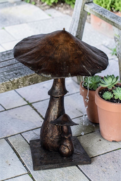 Leaning mushroom bronze statue fountain -  Size: 18"L x 17"W x 24"H.