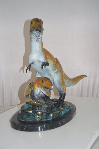 Dinosaur and baby Dino Bronze Statue -  Size: 26"L x 11"W x 18"H.