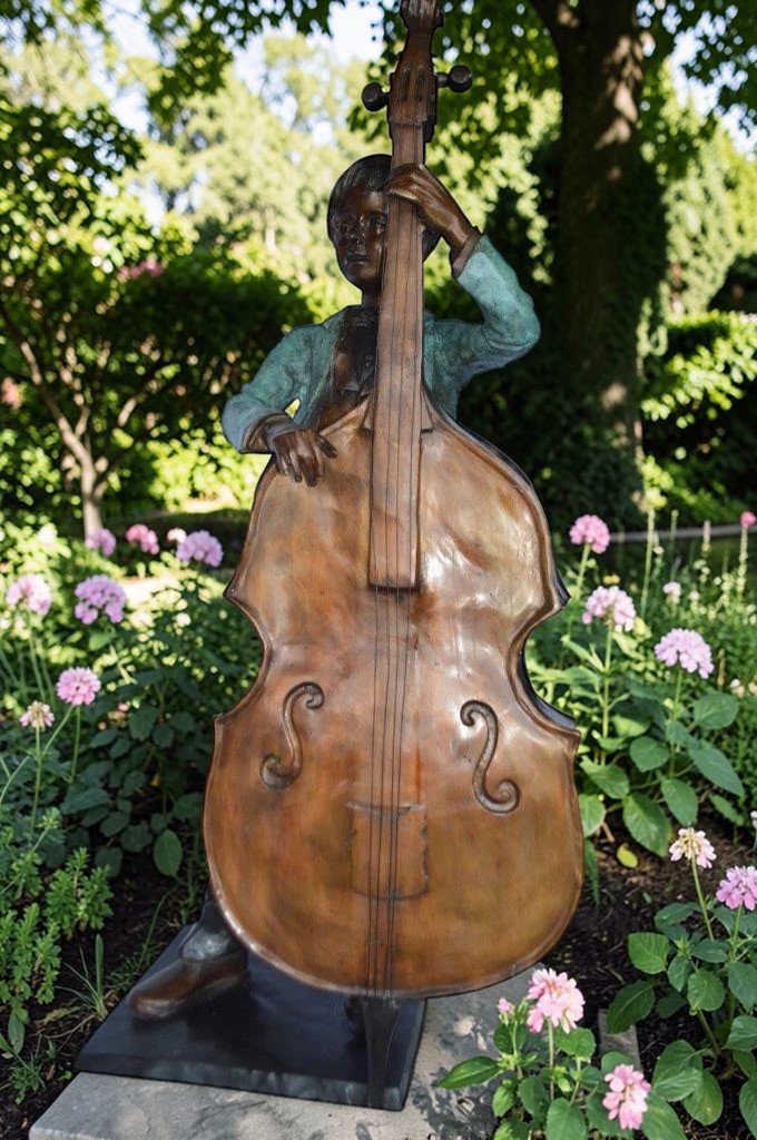 Boy playing cello large bronze statue -  Size: 19"L x 22"W x 59"H.
