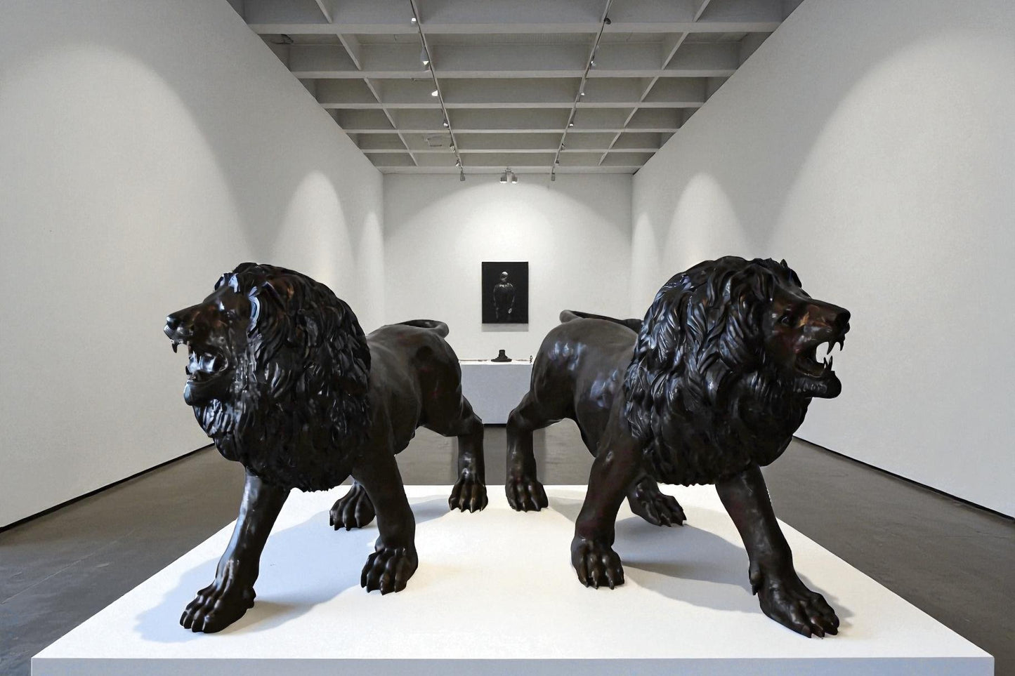 A Pair of Large Lions Walking Side by Side Bronze Statues Size: 24" x 60" x 41"H