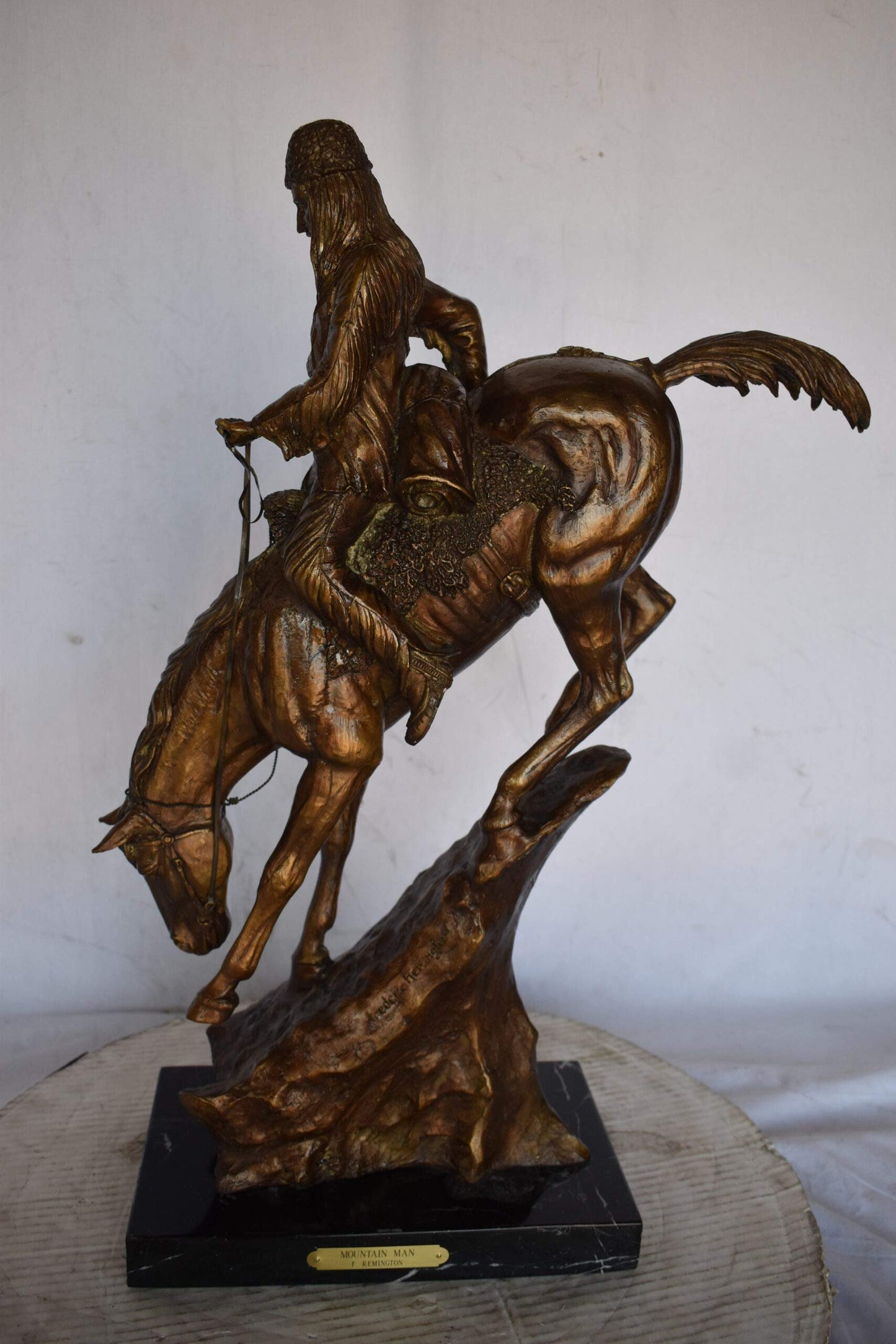 Remington replica Mountain Man bronze statue -  Size: 10"L x 4"W x 15"H.