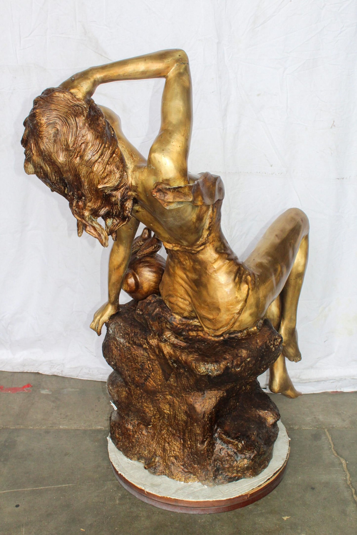 Bronze Outdoor Fountain of a Woman Relaxing on Rocks 49" x 39" x 50"H