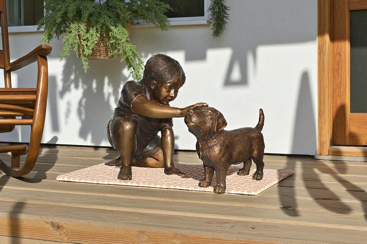 Boy and Dog Bronze Statue - Size: 30"L x 18"W x 18"H.