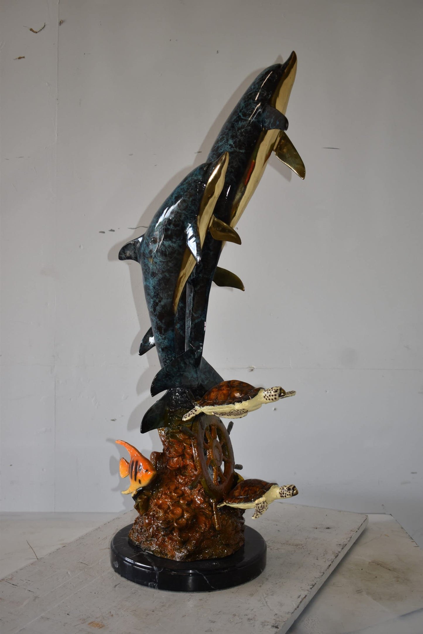 Three Dolphins Turtles and Boat Wheel Bronze Statue Size: 17" x 13" x 40"H