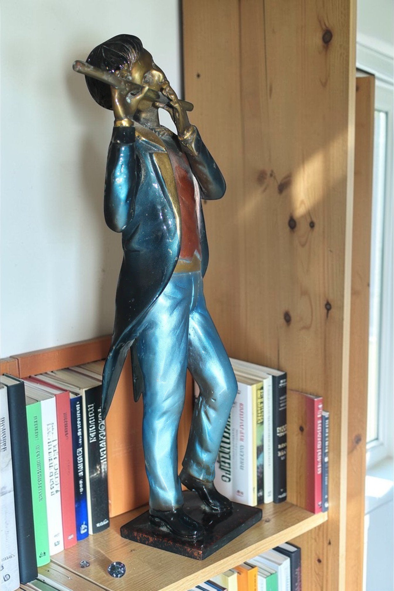 Boy Playing the Flute Bronze Statue -  Size: 5"L x 10"W x 19"H.