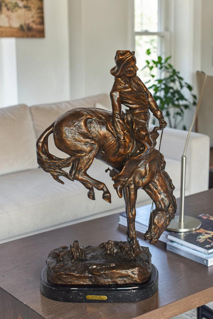 Outlaw by Remington Bronze Statue Replica - Size: 18"L x 10"W x 32"H.
