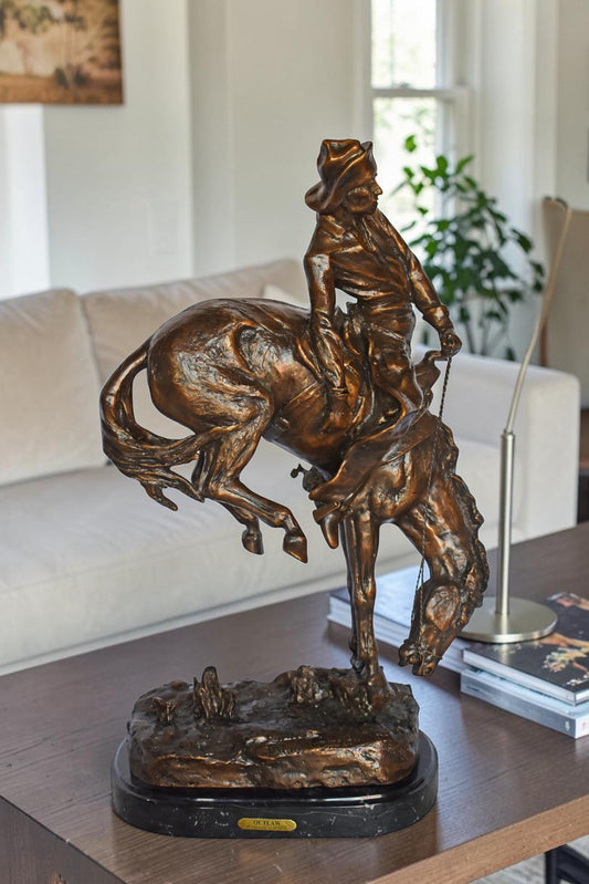 Outlaw by Remington Bronze Statue Replica - Size: 18"L x 10"W x 32"H.