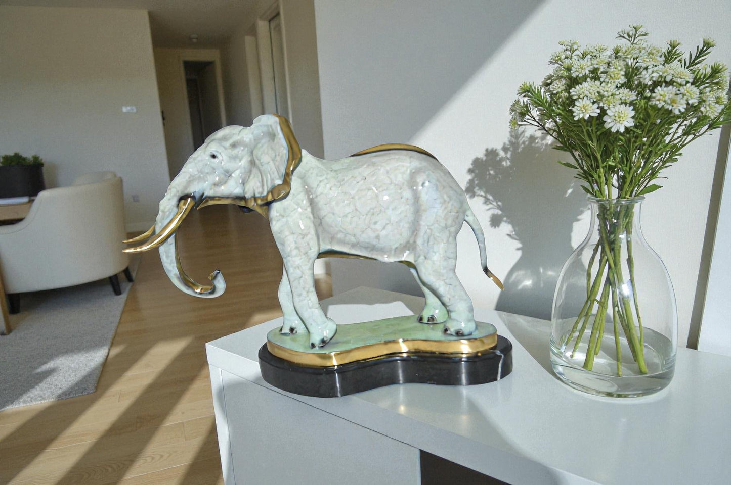 Elephant trunk Down Bronze Statue -  Size: 28"L x 12"W x 17"H.